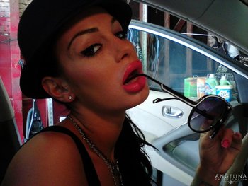 Angelina Valentine teasing with her red lips and pink nails - Angelina-Valentine-Red-Lips (1)