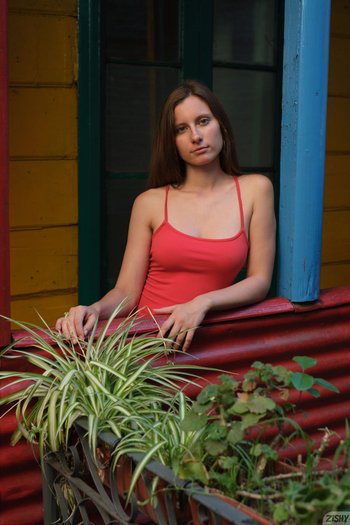 Brunette Tami Fruit with natural tits and hot ass posing on the streets