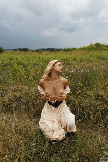 Sweet blonde babe showing off her natural tits - Jezebel Madd