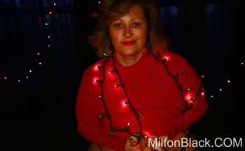 Chubby housewife Murphy has fun showing her big tits and ass for Christmas - 000001