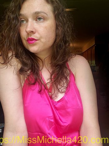 Sweet hottie Miss Michaella showing off her big natural tits