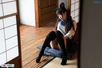 Ria Kurumi masturbates alone in a cute cosplay outfit 003
