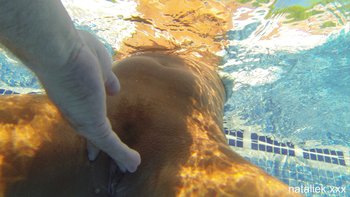 Lovely girl Natalie K teasing with her nice figure in the pool - 000004