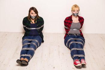 Two chicks on the floor tied up with duct tape - Alt-Girls-Bound-Duct-Tape%20(5)