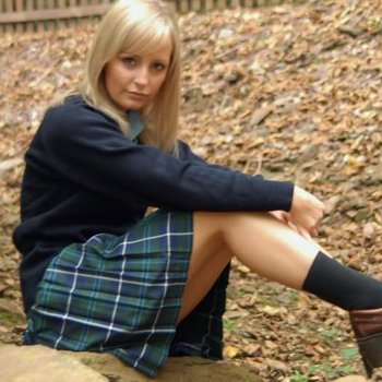 Blonde babe Kelly R posing in her sexy school uniform