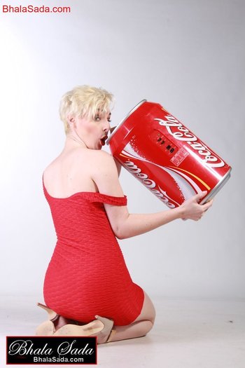 Smoking hot blonde girl loves posing with a big coke can - 000003