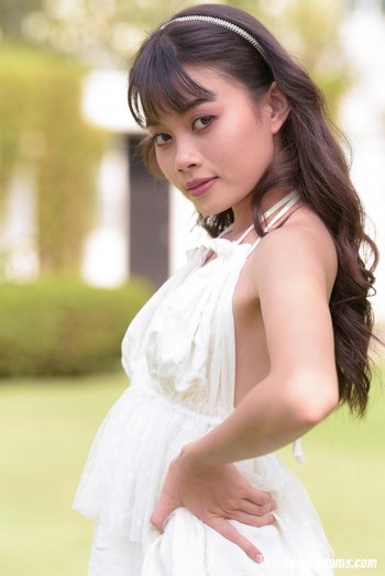 Shy asian girl Sowan looks very beautiful in white