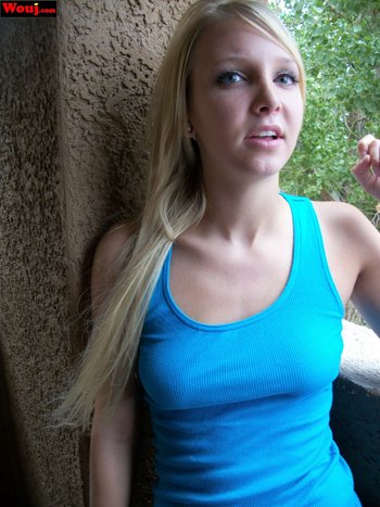 Lovely blonde babe posing in a blue shirt outdoors - 000008